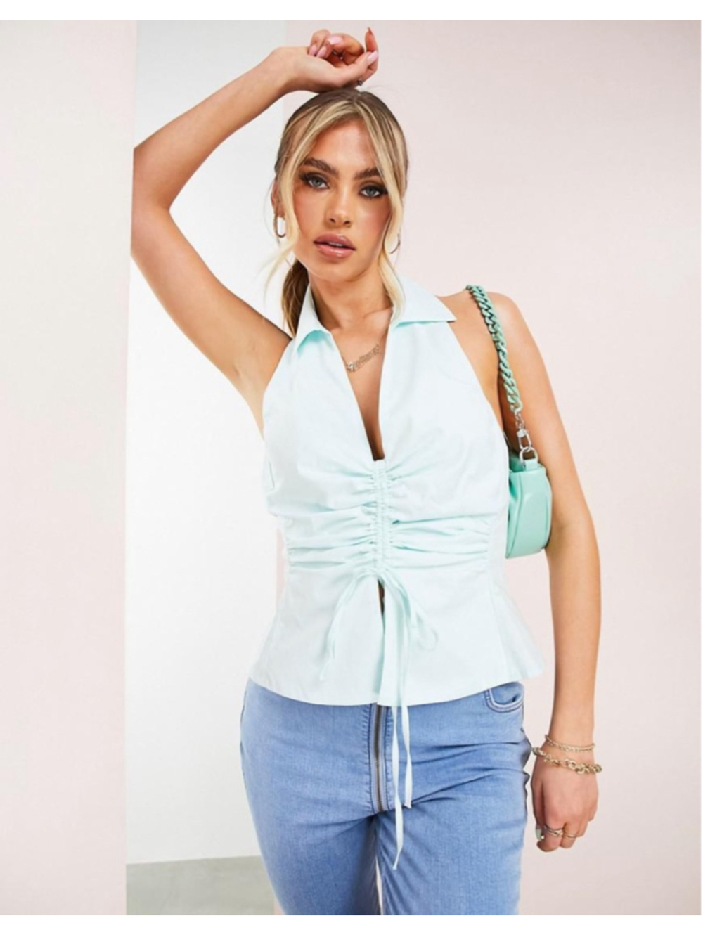 ASOS DESIGN – Sleeveless blouse in pastel blue with ruching at the front US 2
